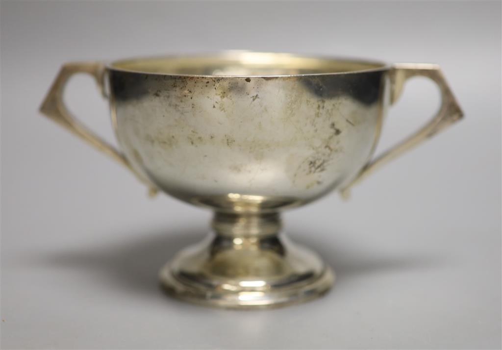 An Anglo-Indian silver two-handled pedestal rose bowl, marked C & K (Cooke & Kelvey), snake and SIL, height 10cm, 12.18oz